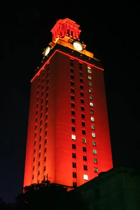 University of Texas Tower lit orange at night